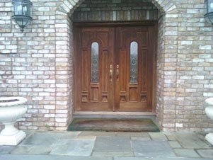 mahogany doors with arcghed glass